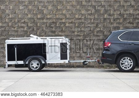 Parked Travel Dog Trailer. All-road Vehicule Hooked