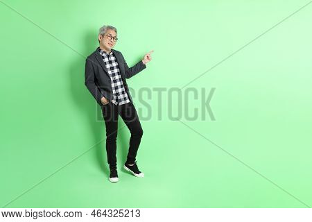 Asian Man On Green
