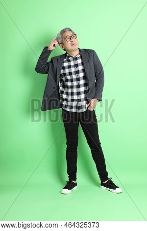 Asian Man On Green