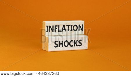 Inflation Shocks Symbol. Concept Words Inflation Shocks On Wooden Blocks. Beautiful Orange Table Ora