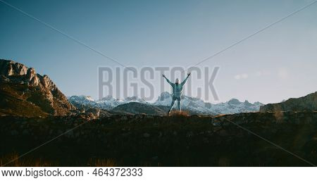Female Traveler Stand On The Bridge With Rise Hands On Winter Vacation Trip Adventure Feeling Free A
