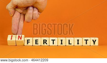 Fertility Or Infertility Symbol. Concept Words Fertility Or Infertility On Wooden Cubes. Doctor Hand