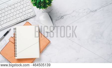 White Office Desk With Keyboard Computer, Mouse, Pen And Notebook, Top View With Copy Space, Mock Up