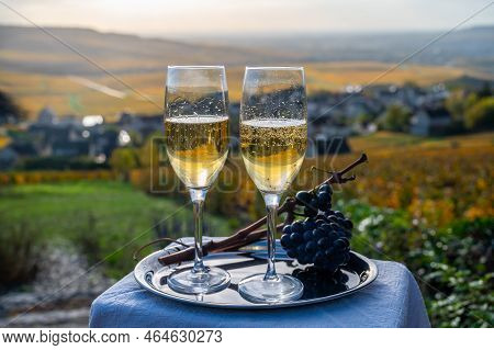 Tasting Of Premier Cru Sparkling White Wine With Bubbles Champagne On Outdoor Terrace With View On C