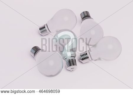 Lack Of Good Ideas. Empty Light Bulbs And A Light Bulb With A Question Mark On A Pastel Background. 