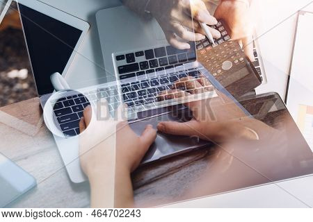 Businesswoman Hand Working With Laptop Computer, Tablet And Smart Phone In Modern Office With Virtua