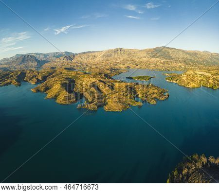 Drone Panoramic View Of Oymapinar Dam Green Lake, Water Reservoir. Huge Mountain Cliffs Around, And 
