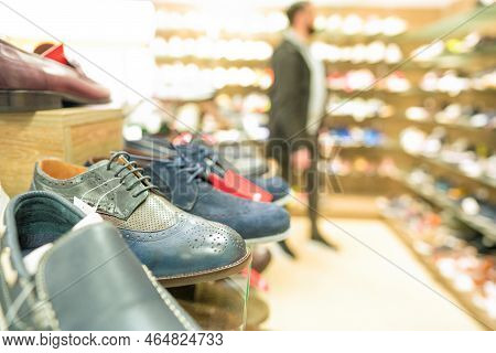 Shelves With Different Footwear At Shoes Store - New Shoes Collection At Secondhand Store. Reselling