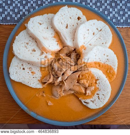 Traditional Chicken Hen On Paprika Or Paprica Creamy Sauce With Bread Dumlings, Typical Czech Food