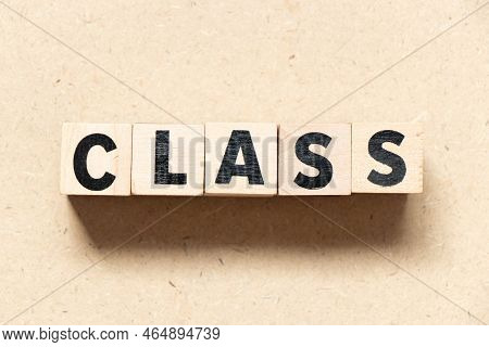 Alphabet Letter Block In Word Class On Wood Background