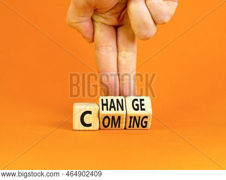 Change Is Coming Symbol. Concept Words Change And Coming On Wooden Cubes. Beautiful Orange Table Ora