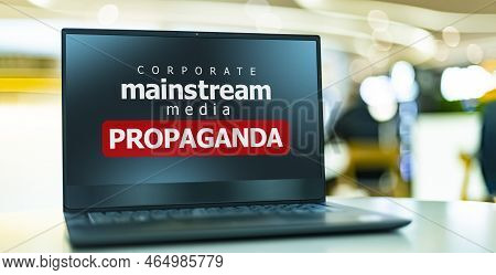A Laptop Computer Displaying The Watchword: Mainstream Media Propaganda