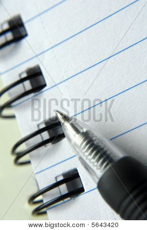 Notebook und Stift