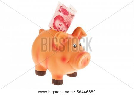chinese yuan banknotes and a piggy bank. isolated against a white background