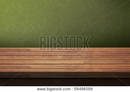 Old wooden table with dark background