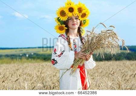 A photo of little beautiful girl is in vintag national clothes