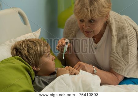 Grandmother Taking Temperature