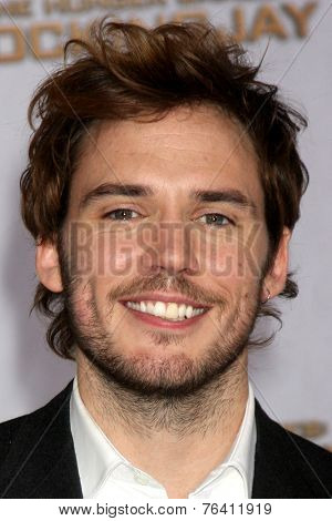 m LOS ANGELES - NOV 17:  Sam Claflin at the The Hunger Games: Mockingjay Part 1 Premiere at the Nokia Theater on November 17, 2014 in Los Angeles, CA