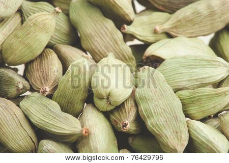 Green cardamom pods close-up. Macro photo