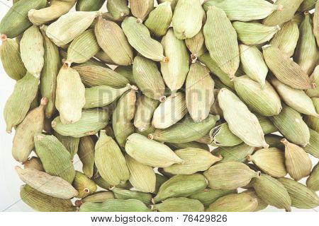 Green cardamom pods close-up. Macro photo