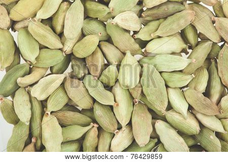Green cardamom pods close-up. Macro photo