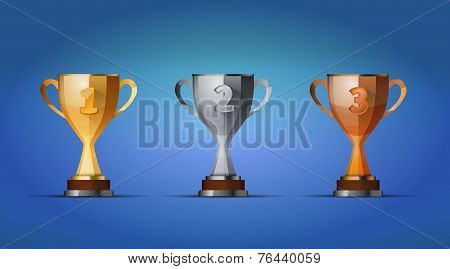 cup of winners award for first, second and third places on a blue background