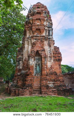 Standing Buddha Statue Inside Ruined Pagoda At Ayuttha Historical Park