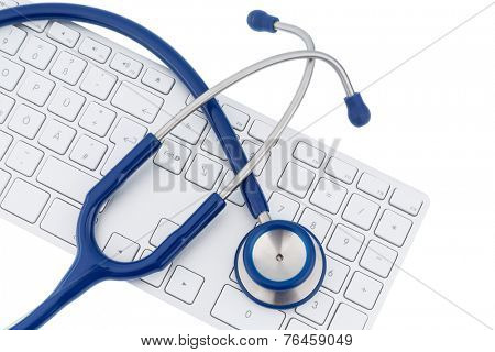 stethoscope and a computer keyboard, symbolic photo for diagnosis and appointment management