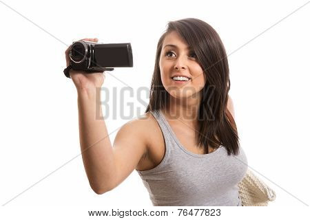 Young cute woman filming