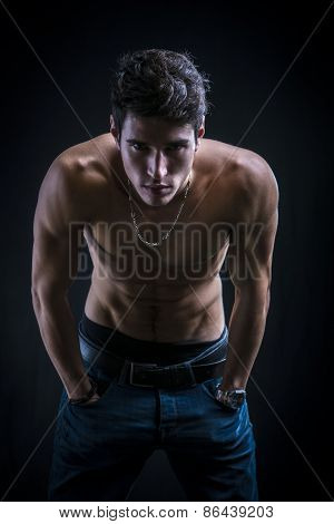 Handsome Muscular Shirtless Young Man Standing Confident