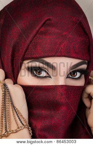 Portrait Of Beautiful Arabian Girl Hiding Her Face