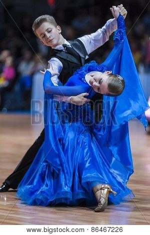 Minsk, Belarus -february 14, 2015: Unidentified Professional Dance Couple Performs Juvenile-1 Standa