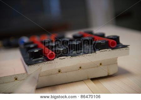 Black underfloor heating posed in a under construction building