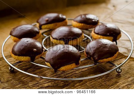 Cookies covered with dark chocolate glaze