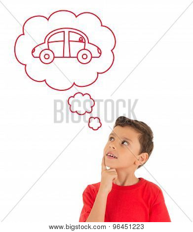 Young Boy looking up and dreaming with a car