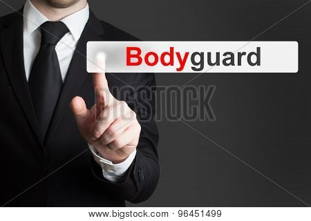Businessman In Suit Pushing Flat Touchscreen Bodyguard