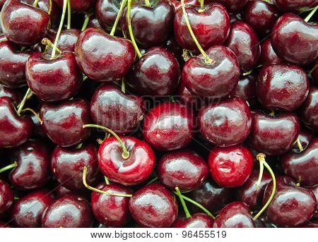 closeup of Red fresh Cherries background in market