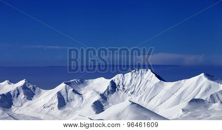 Snowy Mountains At Sunny Day. Panoramic View
