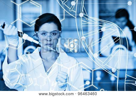 Serious chemist working with white dna helix diagram inteface against science graphic
