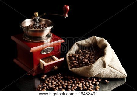Sack Full Of Coffee Beans With Mill