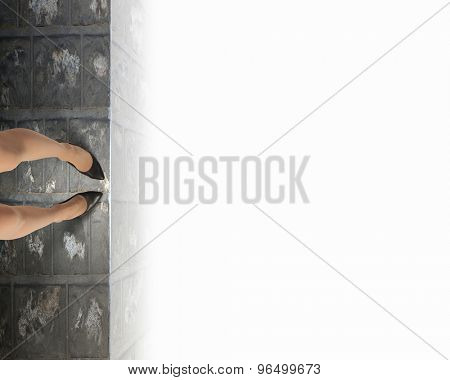 Woman standing on the edge of the roof