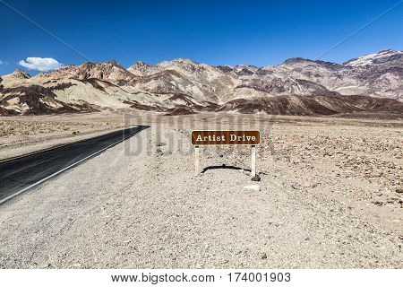 Desert Landscape Narrow Road And Sign Of The Scenic Artist Drive In The Death Valley National Park