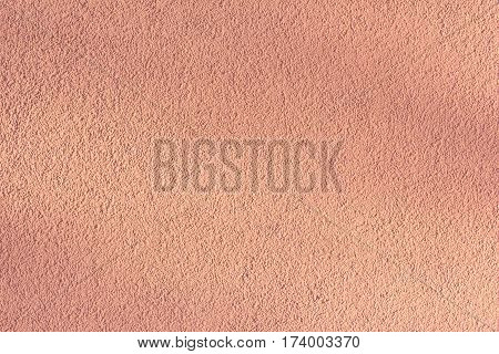 Brown decorative plaster on the wall. Art background.
