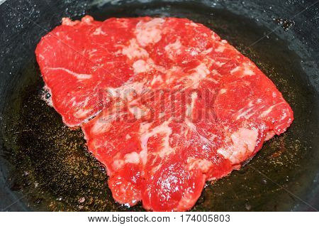 Raw Pork in a cooking process of Pork Tocino.