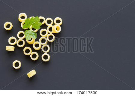 Pasta Rings On A Black Background