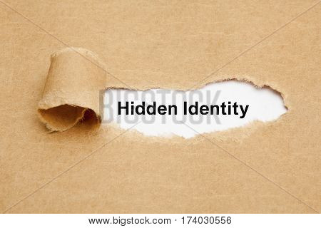 Text Hidden Identity appearing behind ripped brown paper.