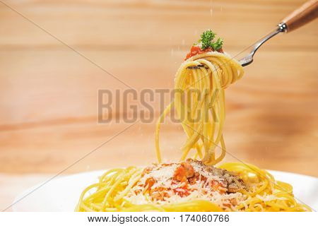 Close-up Of Asta Spaghetti With Tomato Sauce, Olives And Garnish. Italian Food.