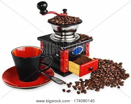 Old antique wooden coffee grinder. Coffee mill hand-painted in black red and blue. Next to the mill black and red cup silver spoon and spilled coffee beans. The whole composition isolated on white background with light shadow and reflection.