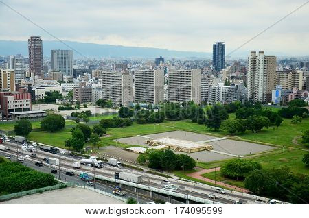 Aerial view cityscape of Osaka city at around Osaka castle on July 10 2015 in Osaka Japan