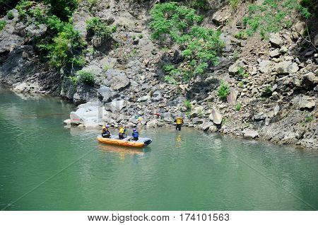Japanese People And Traveler Foreigner Tour Rafting By Inflatable Rubber Boat At Hozugawa River Betw